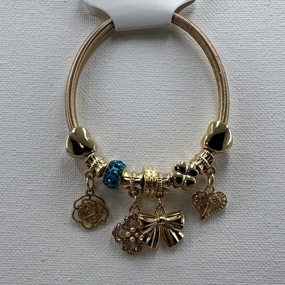 Gold tone Charm stretchy Bracelet with Blue Accents - Picture 2 of 5